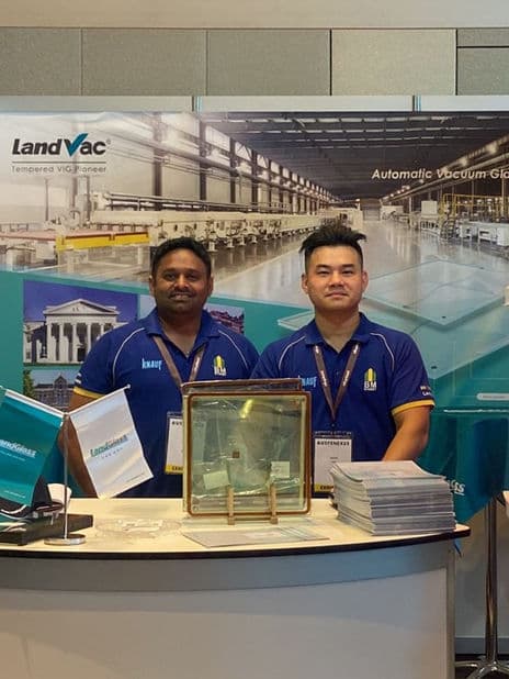 VGA team at a LandVac exhibition stand with glass samples