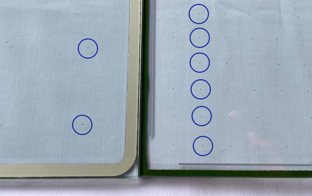 Published side-by-side glass-sample photograph with micro-support pillars circled